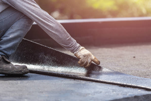 Professional Basement Waterproofing technician working in Chilton, WI